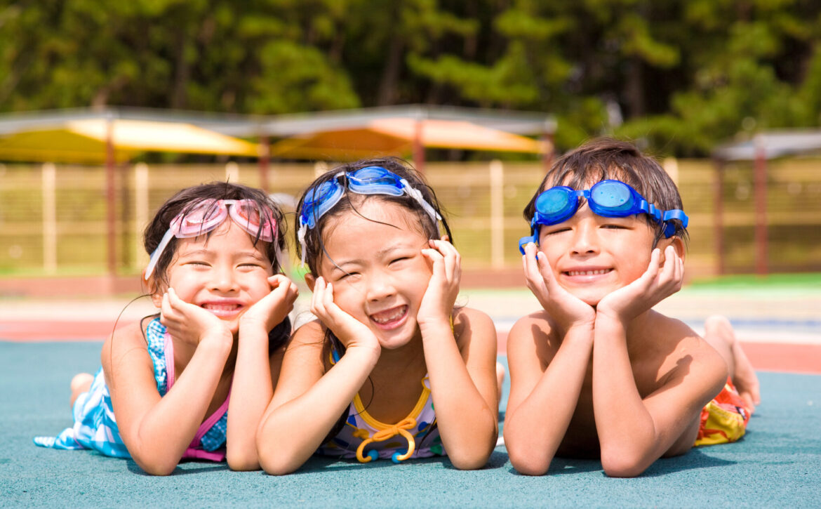 Children swimsuit that is laughing