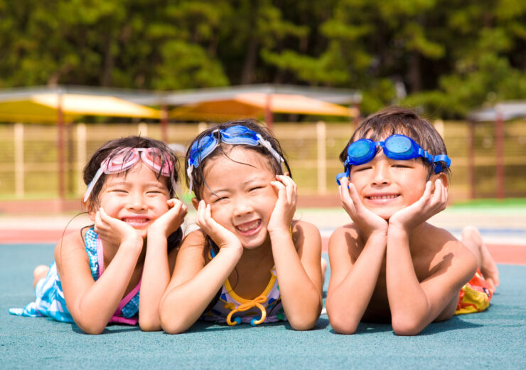 Children swimsuit that is laughing