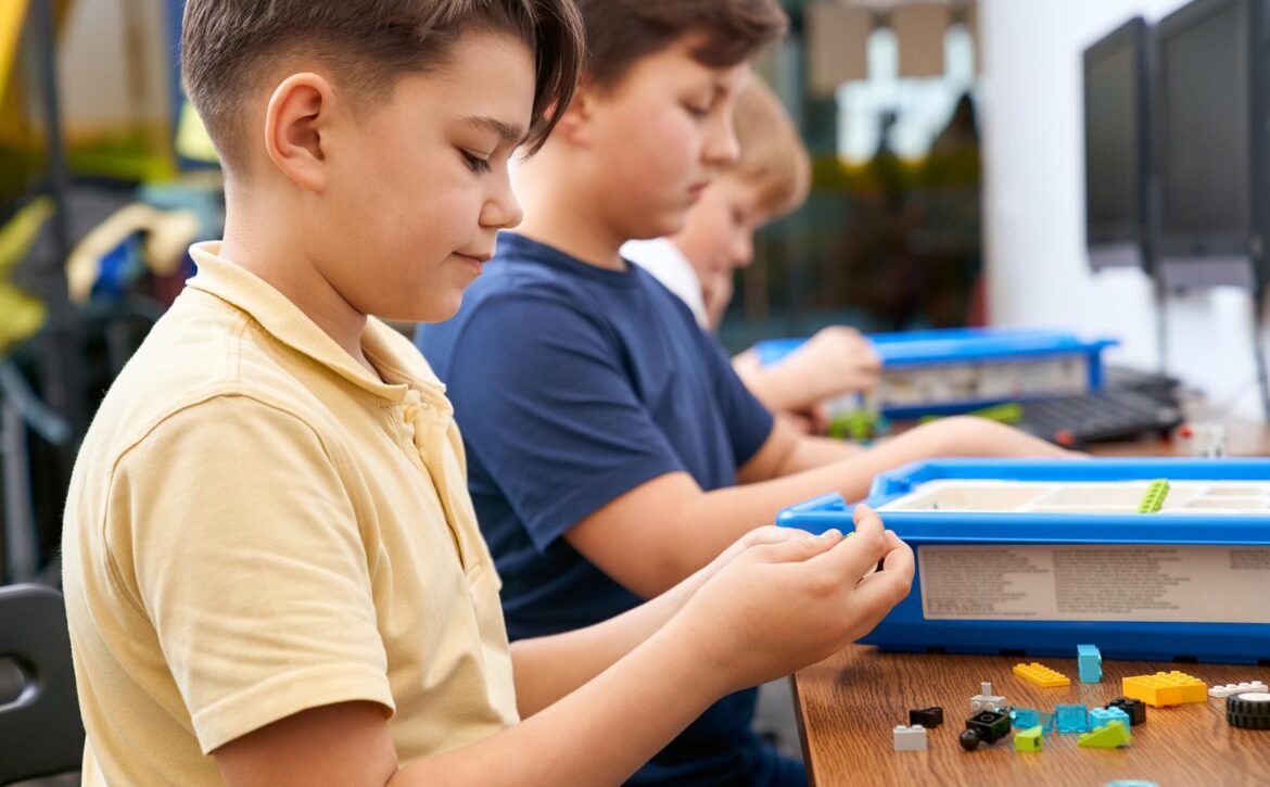 Children using building kit.